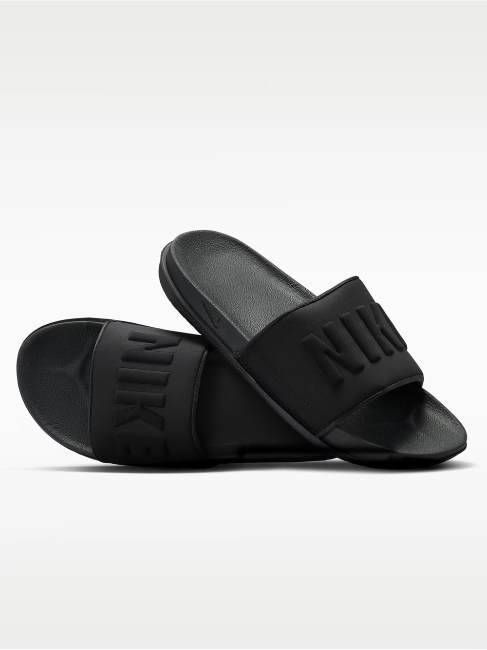 Nike All-Black Slide Sandals with Embossed Logo
